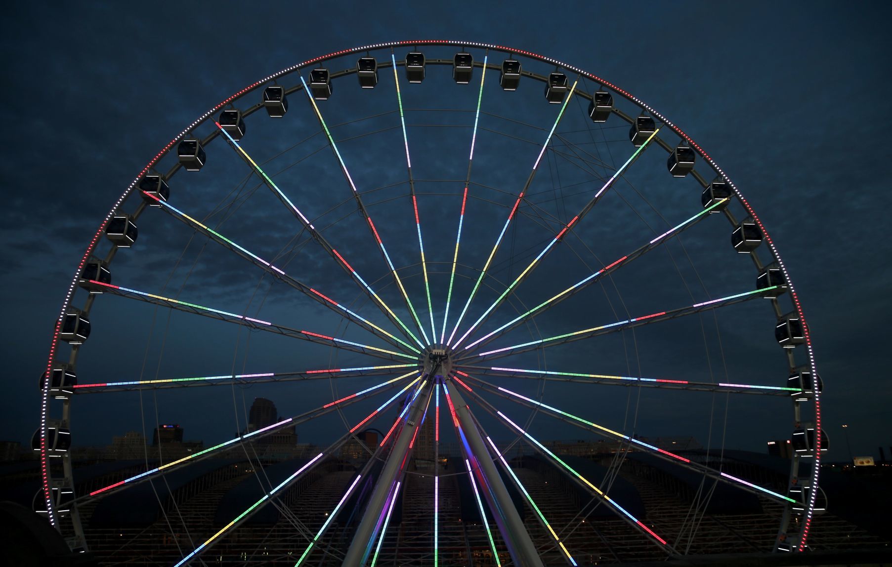 The St. Louis Wheel at Union Station lights up the sky